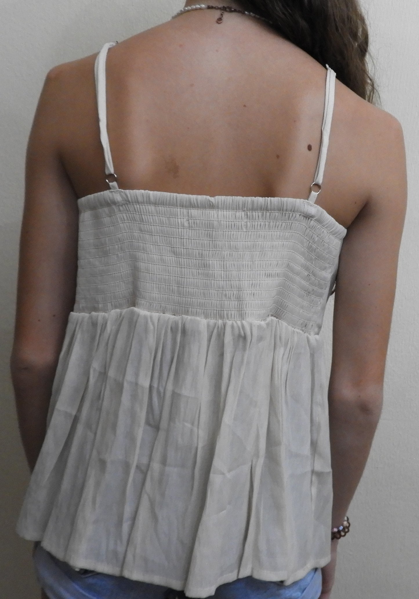 Blusa holgada con tirantes ajustables