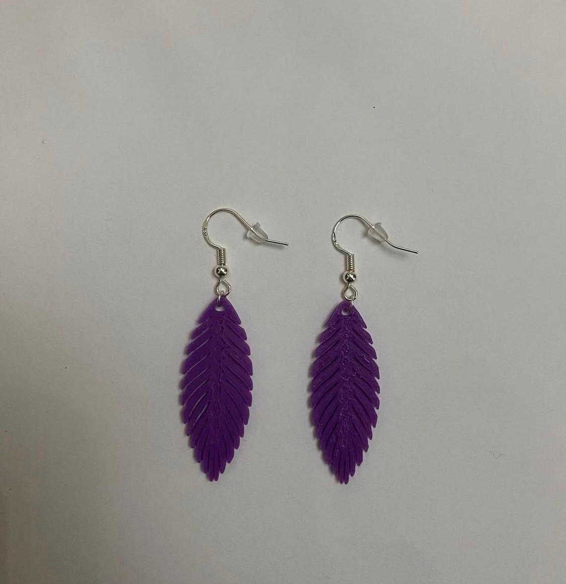 Pendientes plumas