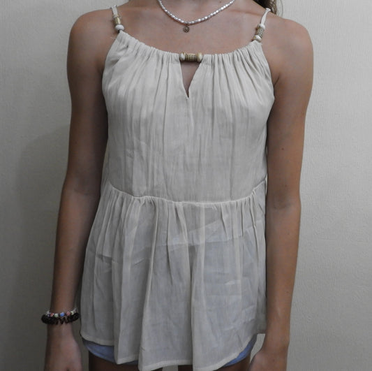 Blusa holgada con tirantes ajustables