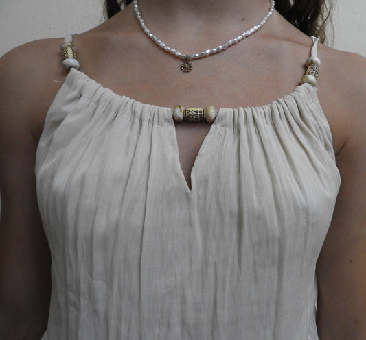 Blusa holgada con tirantes ajustables